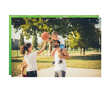 family playing basketball together